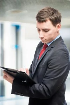 Vertical portrait of a director with important documents Stock Photos