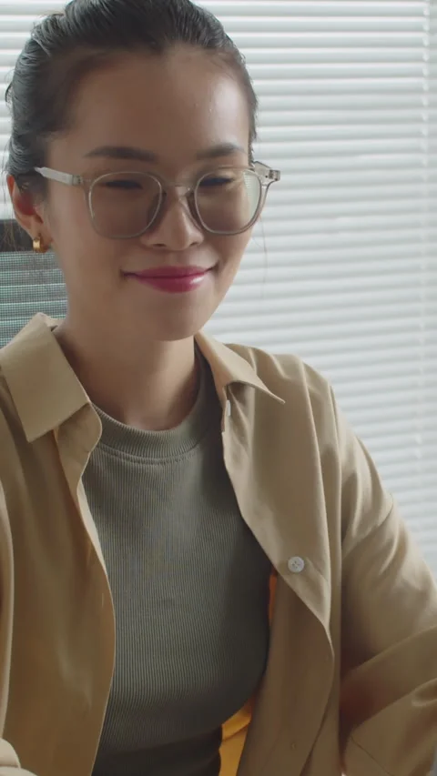 Vertical Portrait of Female Coder Working on Computer Stock Footage 256975399