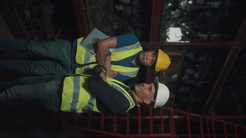 Vertical Portrait of a Professional men Engineering are working in Factory In Stock Footage 151249612