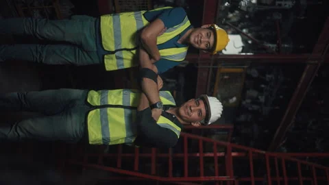 Vertical Portrait of a Professional men Engineering are working in Factory In Vídeos de archivo 151249642