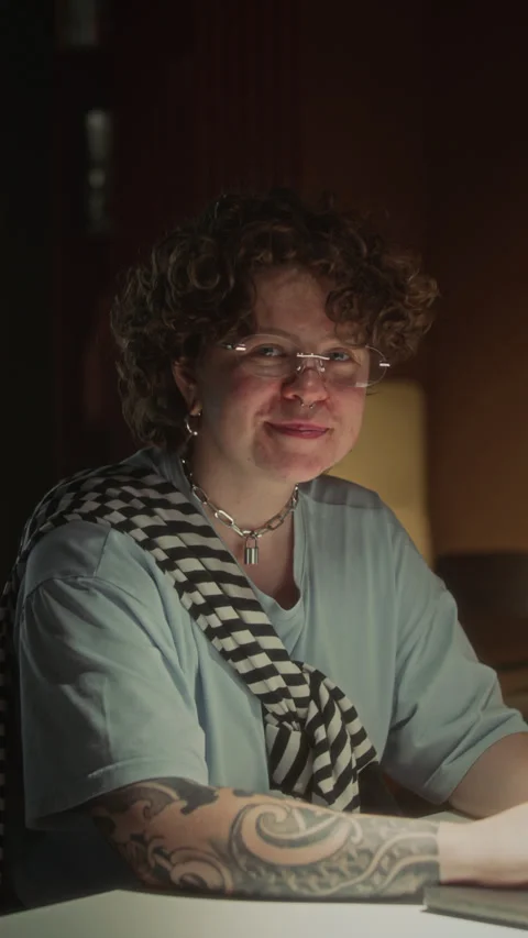 Vertical Portrait of Smiling Gen Z Businesswoman Working in Office at Night Stock-Footage 340499457