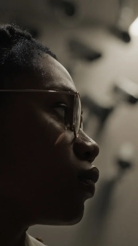 Vertical Portrait of Young Black Man Posing in Security Camera Room Stock Footage 337404755
