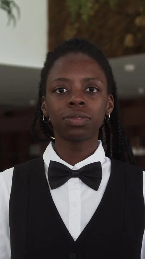 Vertical Portrait of Young Black Waitress in Restaurant Stock Footage 309009638