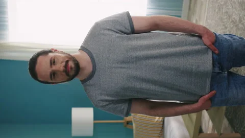 Vertical Portrait of Young Man with Beard Stock Footage 132438993