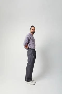 Vertical portrait of young man, posing in the studio. Mind set and mental health 스톡 사진