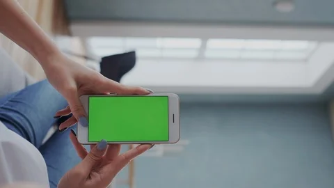Vertical Position shoot. Green Screen or Chroma key Tracking Display on Cellular Stock Footage 122417472