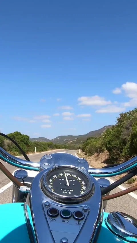 Vertical pov driving on a classic motorcycle Stock Footage 341270731