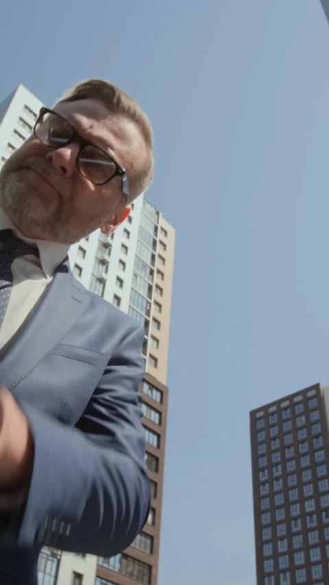 Vertical Pov of Middle Aged Businessman Opening Car Trunk, Looking down Stock Footage 343375232