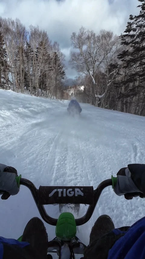 Vertical POV Snow Kart Overtaking on Hokkaido Mountain Slope Stock Footage 333700906
