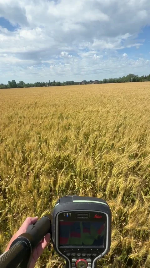 Vertical POV Walking Shot of Surveyor with GNSS Receiver in Barley Field Video stock 346807079