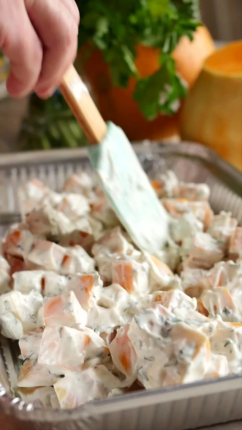Vertical: the process of preparing vegetable casserole from pumpkin and spices.  Stock Footage 262898054