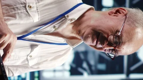 Vertical Professional doing server hub management Stock Footage 247740356