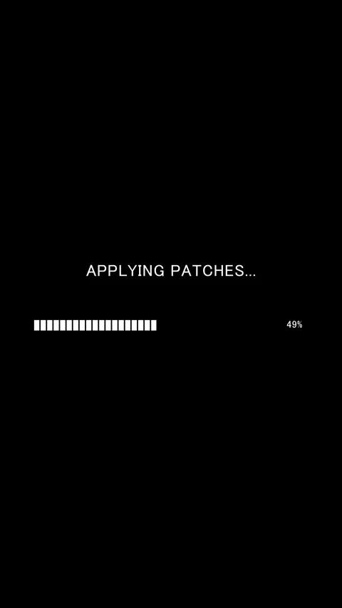 Vertical progress bar with text Applying Patches on black background Stock Footage 337937617