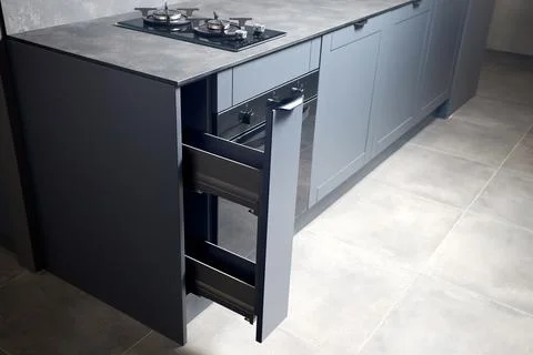 Vertical pull out rack cabinet drawer. Flush up slip handle finger pull handl Stock Photos