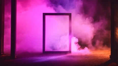 Vertical rectangular frame standing on the ground with pink colored smoke e.. Stock Footage 273954630