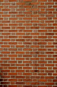Vertical red brick wall Stock Photos