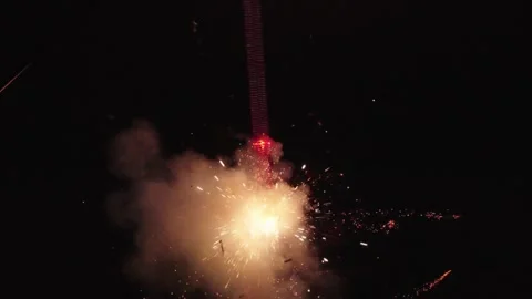 Vertical Red Fireworks Sparklers Igniting Against Night Sky Stockbeeldmateriaal 337408765