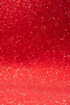 Vertical red glitter background with blur and bokeh Stock Photos