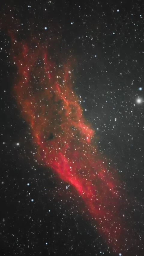 Vertical Red Nebula Deep Space Timelapse with Twinkling Stars and Galaxy Stock Footage 327601083