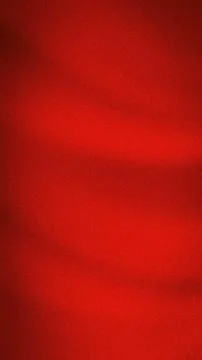 Vertical red orange dark red grainy gradient background with soft blur vibr.. Illustrazione stock