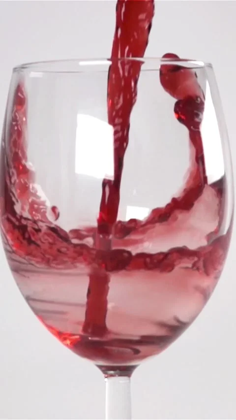 Vertical of Red Wine pouring in slow motion Stock Footage 305517489