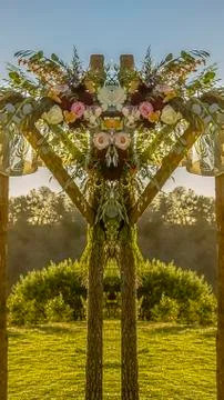 Vertical Reflection view of wedding decorations at sunset Stock Photos