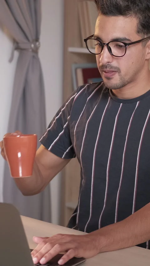 Vertical remote work home office guy using laptop Stock Footage 284292675