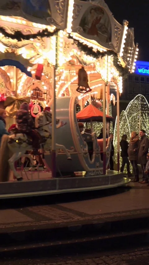 Vertical resolution shot Merry-Go-Round at  german Christmas market Stock Footage 116550666