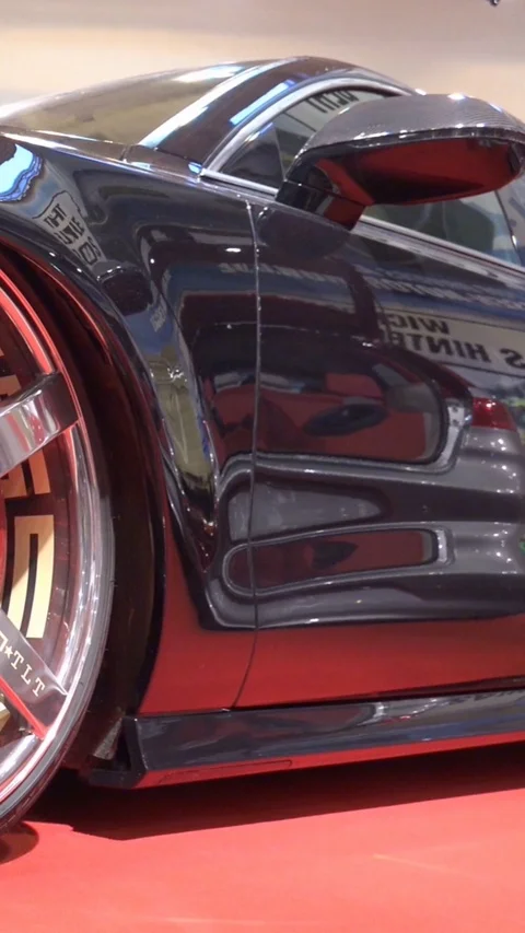 Vertical resolution shot origin US Cars motor exhibition with colorful paintings Stock Footage 116742867