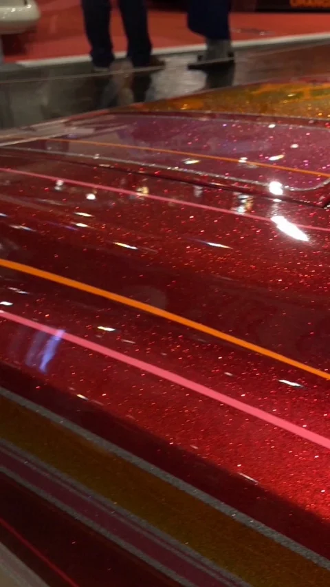 Vertical resolution shot origin US Cars motor exhibition with colorful paintings Stock Footage 116744311