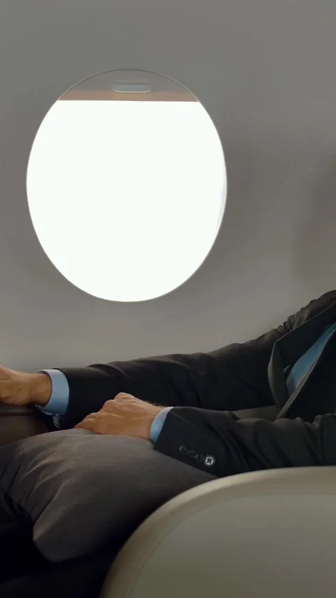Vertical of Rich entrepreneur working on notebook inside of luxury jet Stock Footage 277281411