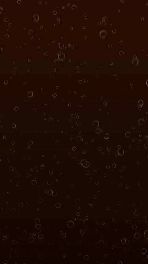 Vertical Rising Brown Cola Coffee Bubbles 4K Seamless Loop Video stock 334295448