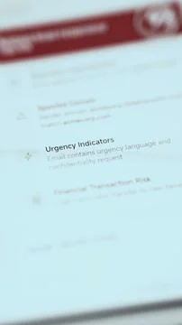 Vertical risk analysis highlights urgency language and a confidentiality Stock Photos