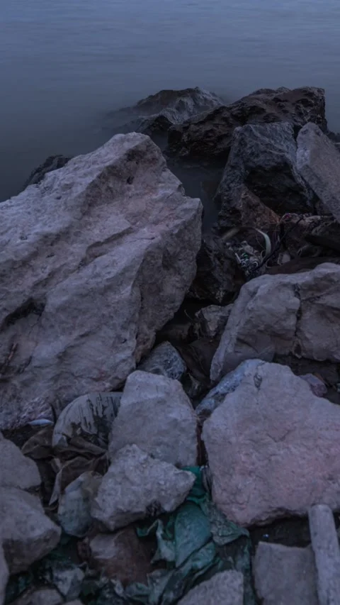 Vertical Riverside Reef Rocks Water Wave Motion Nature Timelapse Stock Footage 327676691