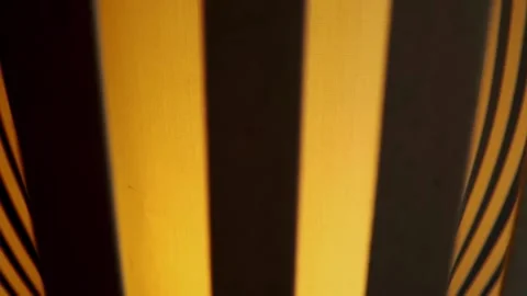 Vertical rotating bands or stripes of yellow light. Atmospheric abstract 스톡 동영상 155919378