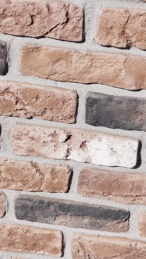 Vertical Rotating Brick Wall Texture 4K HDR Slow Motion Stock Footage 333696605