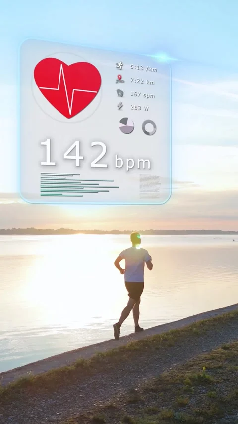 Vertical of Runner Tracking Heart Rate and infographic. Fitness HUD at Sunrise Stock Footage 340227553