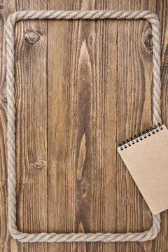 Vertical rustic workspace with notebook Stock Photos