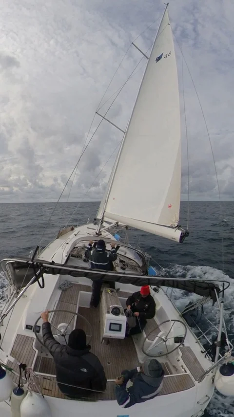 Vertical, Sailboat run over the winter sea,cloudy with sun, 360 effect Stock Footage 120744925