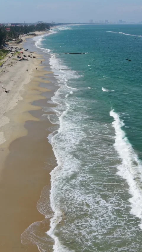 Vertical screen Aerial Wide Coastline View Hoi An With Broad Shoreline, Rolling Stock Footage 340000559