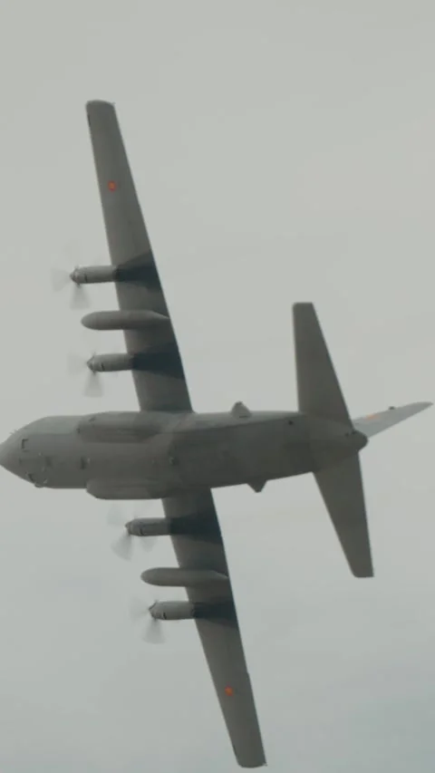 Vertical Screen Air Force Lockheed C-130H Hercules flight at the Bucharest Air Stock Footage 303506893