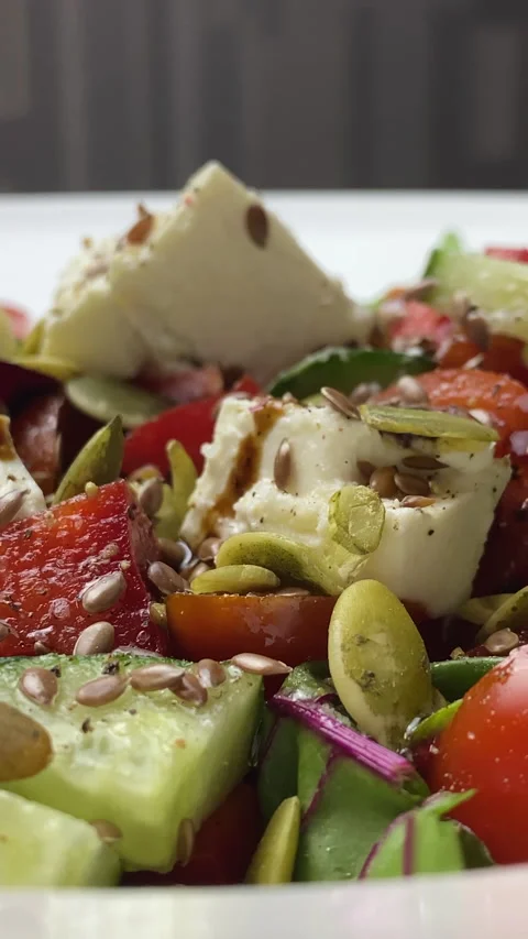 Vertical screen: Balsamic Vinegar Lettuce And Tomato Salad. Dieting Healthy Food Stock Footage 238996255