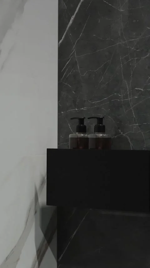 Vertical screen: Bathroom black shelves with decorative elements in interior 動画素材 311259617