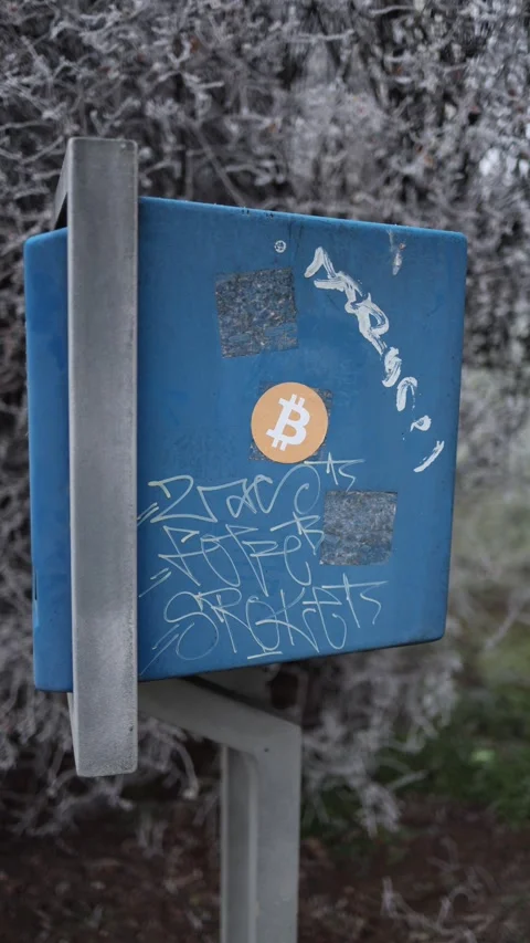Vertical screen Bitcoin icon is already on the streets at every step Stock Footage 296543698
