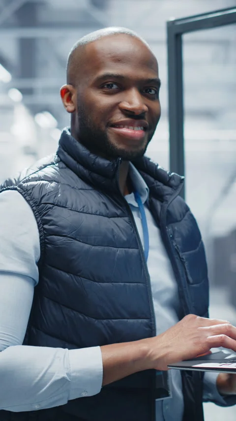 Vertical Screen Black Data Center Engineer Using Laptop Computer Stock Footage 320867745