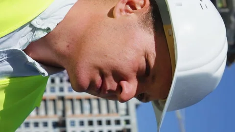 Vertical Screen: Building contractor portrait standing at construction site Stock Footage 167092882