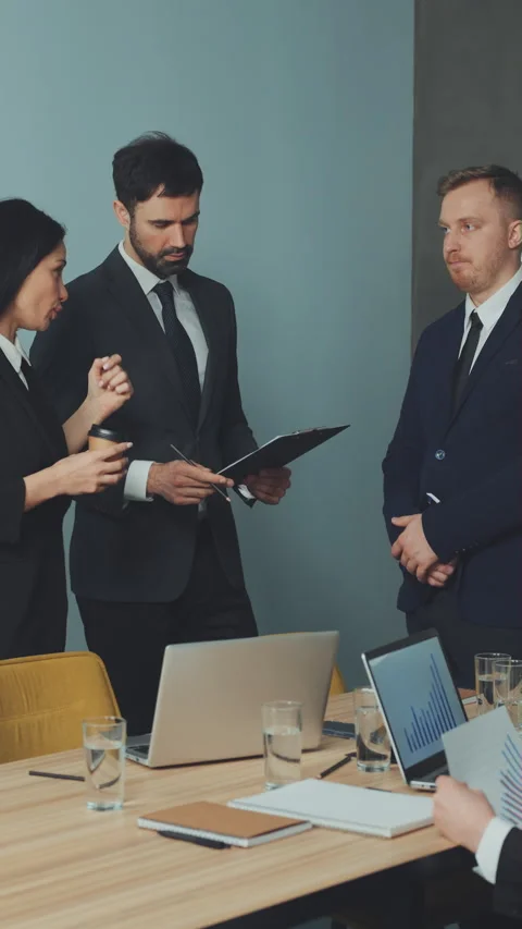 Vertical Screen: Business professionals discussing strategy during meeting Stock Footage 280206254