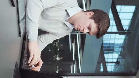 Vertical Screen: Businessman preparing report in office Stock Footage 239618934