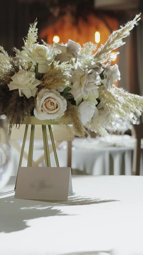 Vertical screen: A charming video showcases an elegant wedding reception setup Stock Footage 308396639