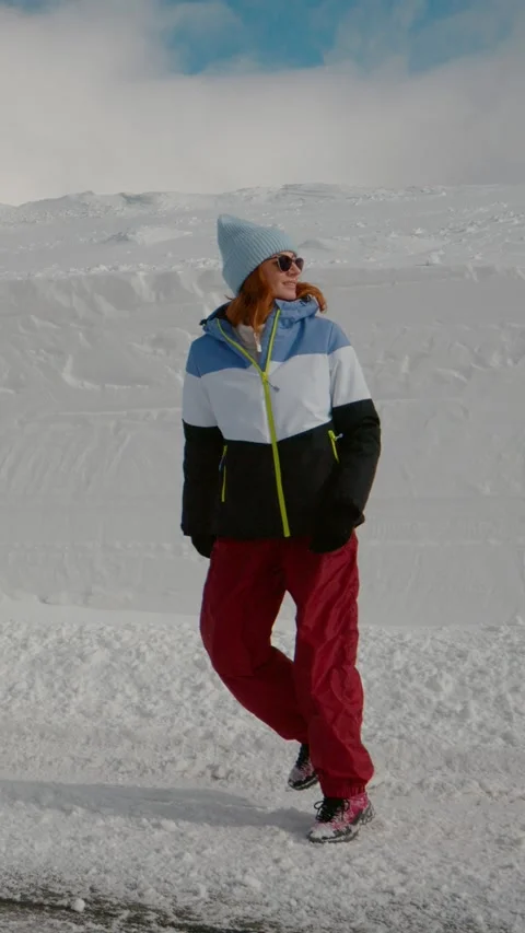 Vertical Screen Climbing the mountains being well equiped with winter clothes. Stock Footage 299996283